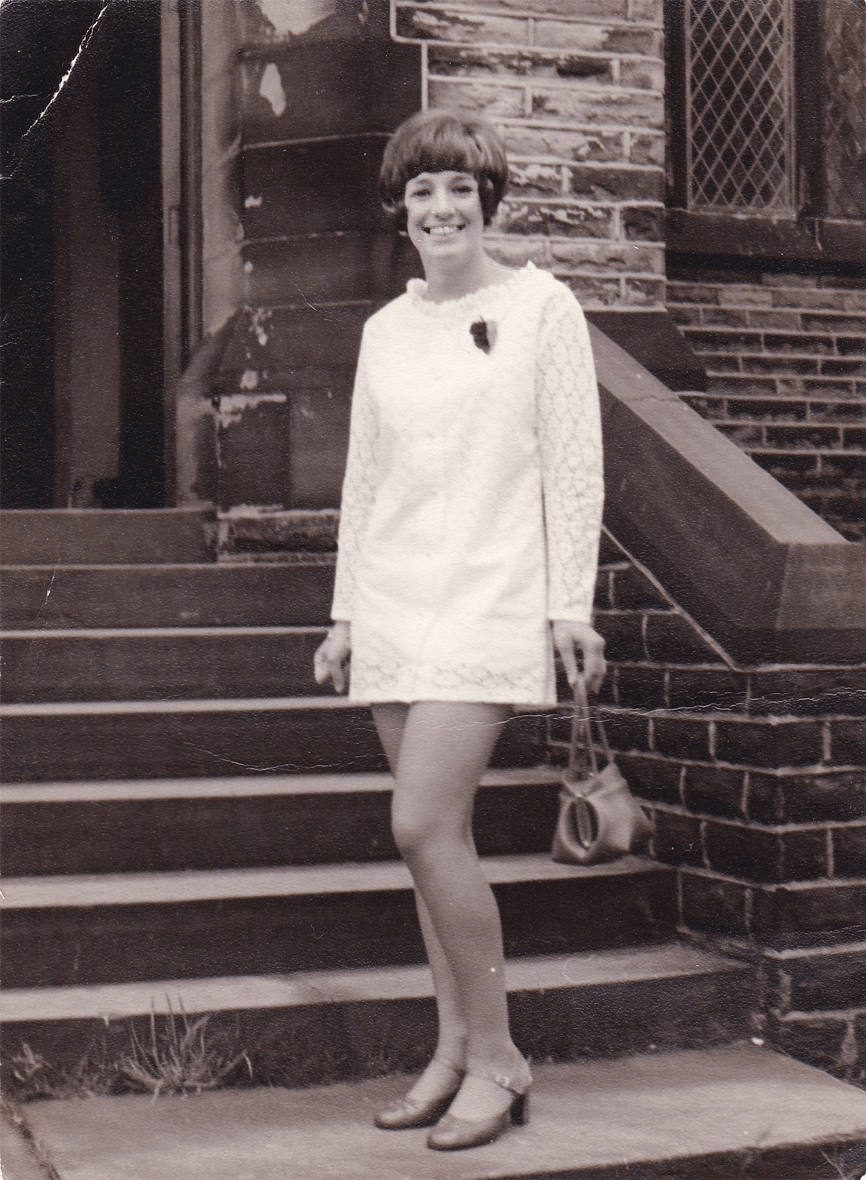 Photo of a young woman in a Sixties-style dress
